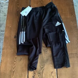 Adidas Black Sweatpants with Three Stripes and Relaxed Fit